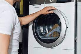 Here's How Much Your Dryer Weighs (And Tips On Moving It Safely)